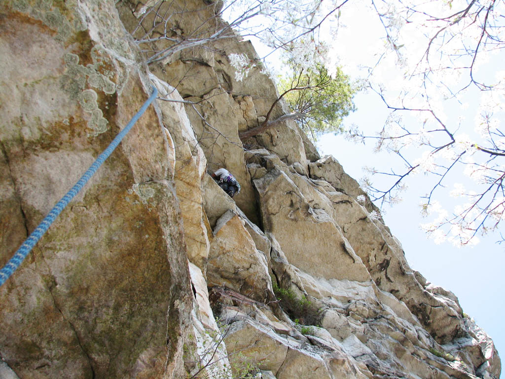 Vijay at the start of the Modern Times roof. (Category:  Rock Climbing)