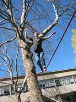 Keith highlining.  I really like how his arms mirror the tree limbs. (Category:  Slacklining)