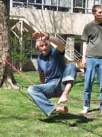 Patrick doing a sit start. (Category:  Slacklining)