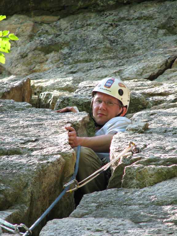 Ryan wedged in an offwidth crack on Inverted Layback.  I found it much easier to stay outside the crack when I seconded the pitch. (Category:  Rock Climbing)