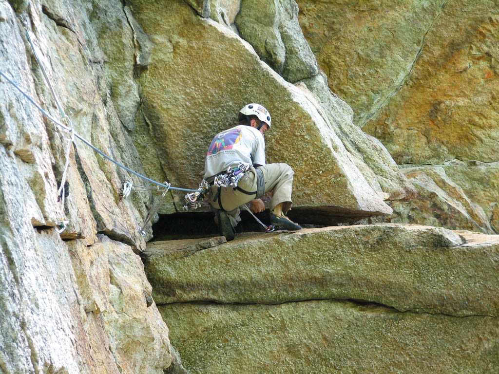 Ryan moving through the crux of Inverted Layback. (Category:  Rock Climbing)