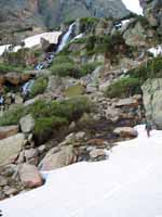 The approach to Petit Grepon is gorgeous.  Alpine snowfields and waterfalls. (Category:  Rock Climbing)