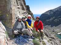 Ryan, Alana, Tom and me hanging out on a ledge at the top of the third pitch of Petit Grepon. (Category:  Rock Climbing)
