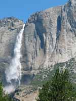 Yosemite falls, the third highest waterfall in the world.  Lost Arrow Spire is the projection on the right side of the photo which casts a shadow back on the main cliff. (Category:  Rock Climbing)