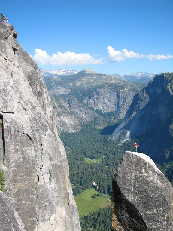 Jess doing the tyrolean from Lost Arrow Spire to the north rim. (Category:  Rock Climbing)