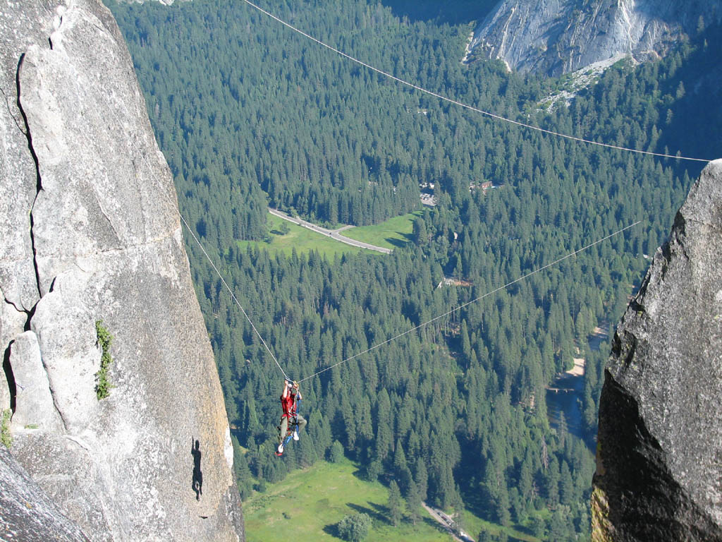 Ryan doing the tyrolean from Lost Arrow Spire to the north rim. (Category:  Rock Climbing)