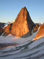Sun illuminating Snowpatch Spire in the morning. (Category:  Rock Climbing)