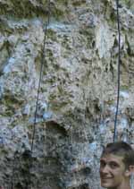 Alex at the bottom of a panorama of Choss Family Robinson. (Category:  Rock Climbing)