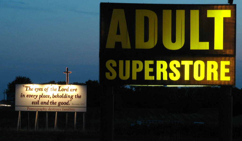 We thought these signs were particularly funny.  We didn't see any anti-evolution billboards, but I suspect they exist somewhere in Kansas. (Category:  Rock Climbing)