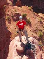 Ryan at the third belay as seen from the top of Ancient Art. (Category:  Rock Climbing)