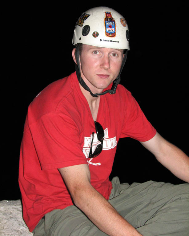 Ryan preparing for bed on Dinner Ledge at the top of the third pitch on the South Face of Washington Column. (Category:  Rock Climbing)