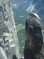 Damian slacklining Lost Arrow Spire.  I wasn't there, but got this photo off the web. (Category:  Rock Climbing)