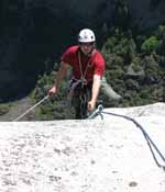 Ryan reaching the top of the spire. (Category:  Rock Climbing)
