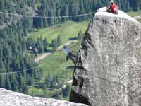 Jess starting the tyrolean from Lost Arrow Spire to the north rim. (Category:  Rock Climbing)
