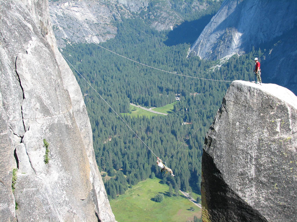 Jess doing the tyrolean from Lost Arrow Spire to the north rim. (Category:  Rock Climbing)