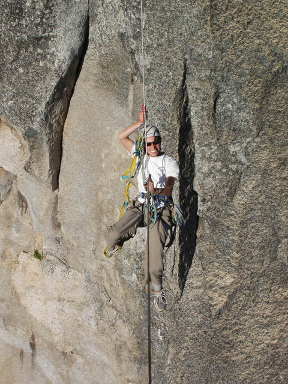 Jess doing the tyrolean from Lost Arrow Spire to the north rim. (Category:  Rock Climbing)
