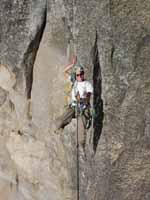 Jess doing the tyrolean from Lost Arrow Spire to the north rim. (Category:  Rock Climbing)