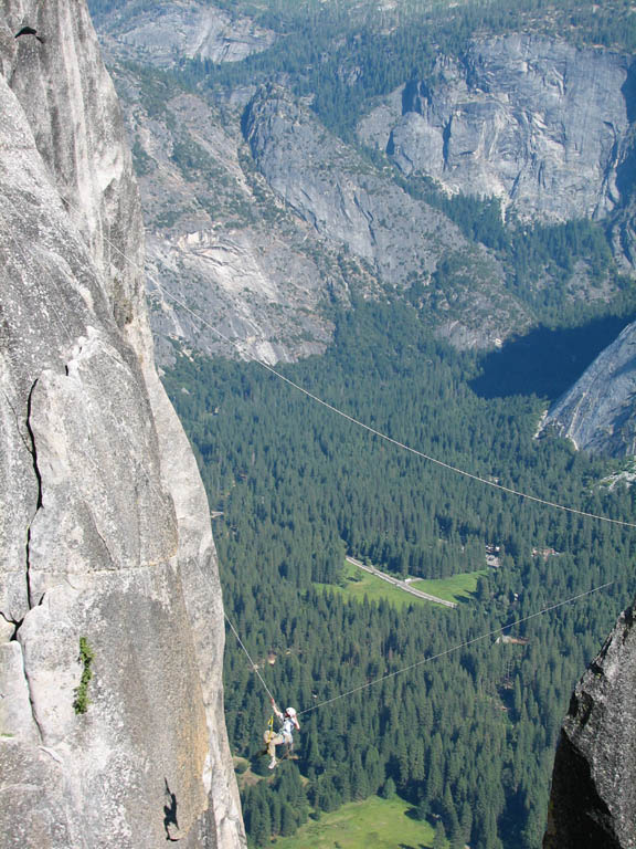 Jess doing the tyrolean from Lost Arrow Spire to the north rim. (Category:  Rock Climbing)