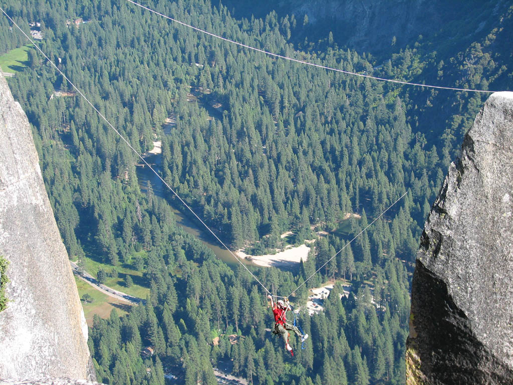 Ryan doing the tyrolean from Lost Arrow Spire to the north rim. (Category:  Rock Climbing)