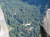 Ryan doing the tyrolean from Lost Arrow Spire to the north rim. (Category:  Rock Climbing)