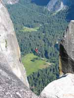 Ryan doing the tyrolean from Lost Arrow Spire to the north rim. (Category:  Rock Climbing)