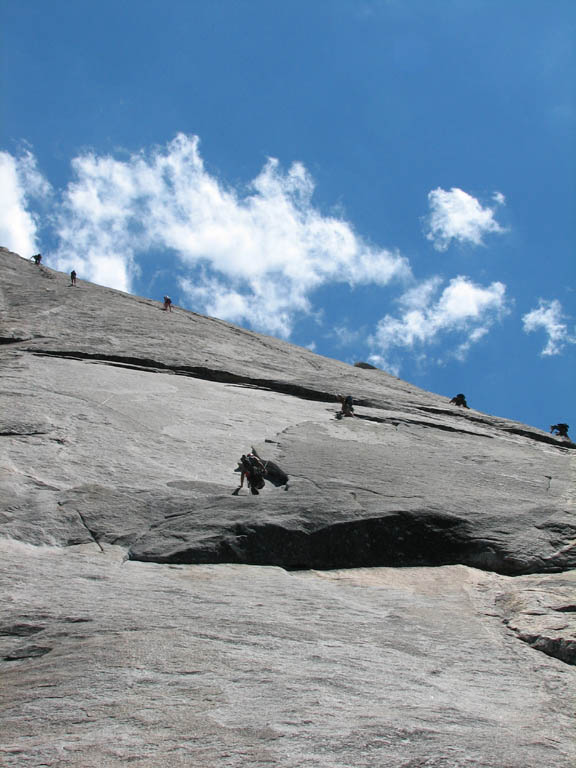 Snake Dike route up Half Dome.  Four parties are visible in this shot. (Category:  Rock Climbing)