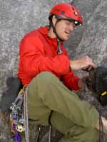 Putting on climbing shoes at the base of Super Direct. (Category:  Rock Climbing)