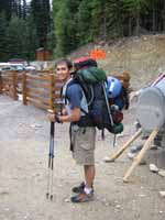 Joe with his overloaded pack. (Category:  Rock Climbing)