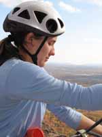 Danica belaying on the High E ledge. (Category:  Rock Climbing)