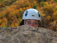 Sarah reaching the High E belay ledge. (Category:  Rock Climbing)