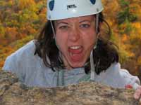 Sarah reaching the High E belay ledge. (Category:  Rock Climbing)