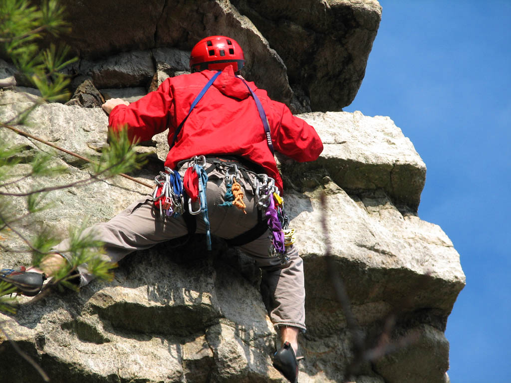 Leading the traverse on the direct variation to the third pitch of Thin Slabs. (Category:  Rock Climbing)