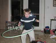 Philip with the hula hoop. (Category:  Party)