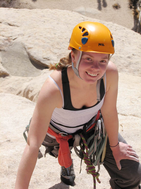 Kristin reaching the top of Mike's Books, Intersection Rock. (Category:  Rock Climbing)