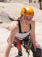 Kristin reaching the top of Mike's Books, Intersection Rock. (Category:  Rock Climbing)