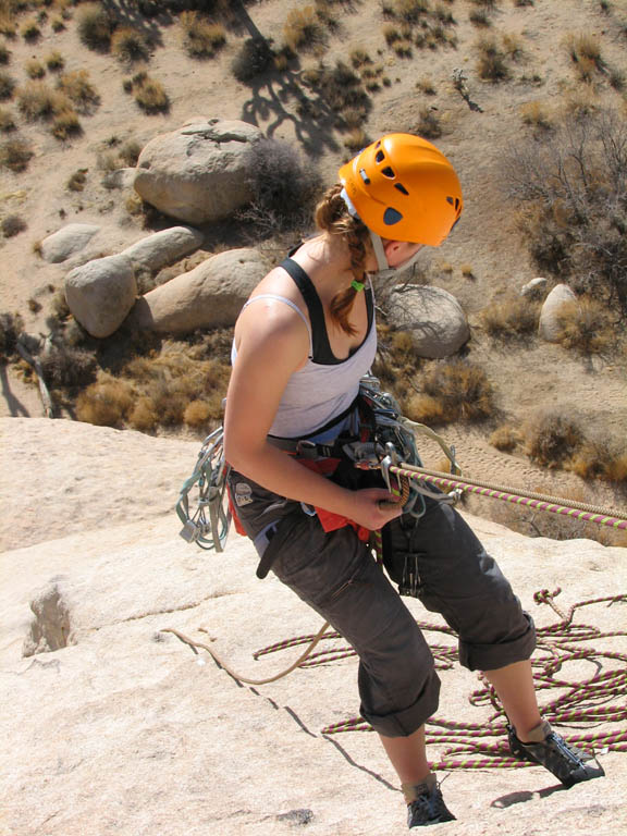 Kristin rappelling off Mike's Books, Intersection Rock. (Category:  Rock Climbing)