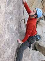 Kenny on the hard opening moves of The Kid, Saddle Rock. (Category:  Rock Climbing)