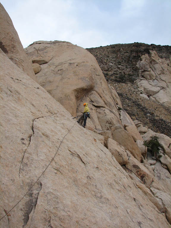 Kristin at the first rappel station descending from Walk on the Wild Side. (Category:  Rock Climbing)