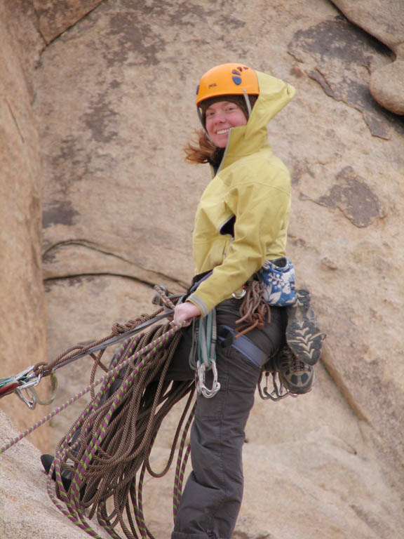 Kristin at the first rappel station descending from Walk on the Wild Side. (Category:  Rock Climbing)