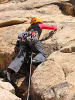 Kristin leading the first pitch of The Swift, Lost Horse Wall. (Category:  Rock Climbing)