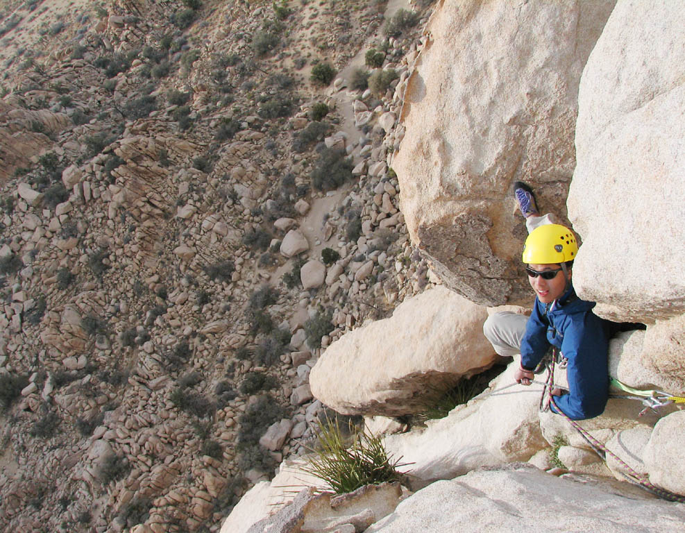 Aramy belaying Kristin up the third pitch of The Swift, Lost Horse Wall. (Category:  Rock Climbing)