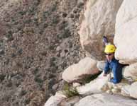 Aramy belaying Kristin up the third pitch of The Swift, Lost Horse Wall. (Category:  Rock Climbing)