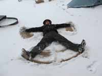 Kenny making a snow angel. (Category:  Rock Climbing)