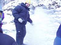 Mark demonstrating screw placement. (Category:  Ice Climbing)
