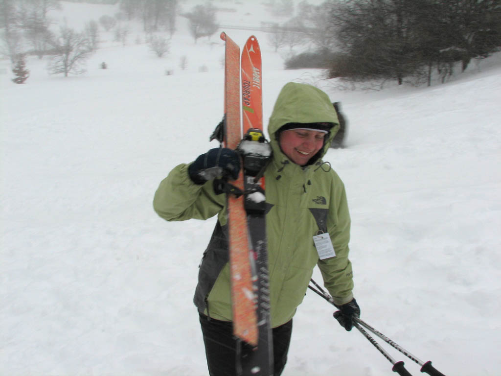 Erika walking up the hill.  She had her skins, but it wasn't worth the trouble to put them on. (Category:  Skiing)