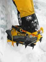 Yellow gaiters, boots and crampons. (Category:  Ice Climbing)