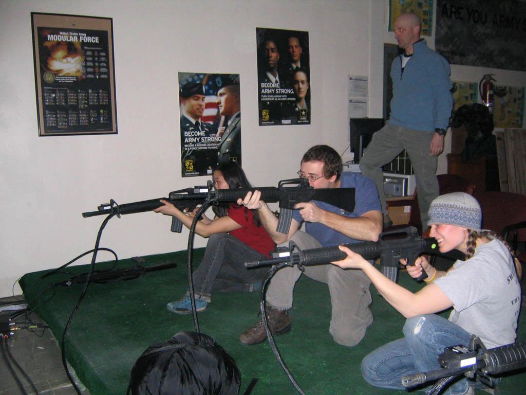 Felicia, me and Anna shooting M-16s. (Category:  Party)