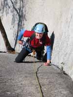 Anna following The Great Arch. (Category:  Rock Climbing)