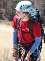 Anna reaching the top of The Great Arch. (Category:  Rock Climbing)