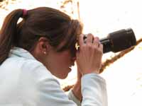 Heather taking a picture.  Shot at f3.5, 1/30sec (Category:  Backpacking)